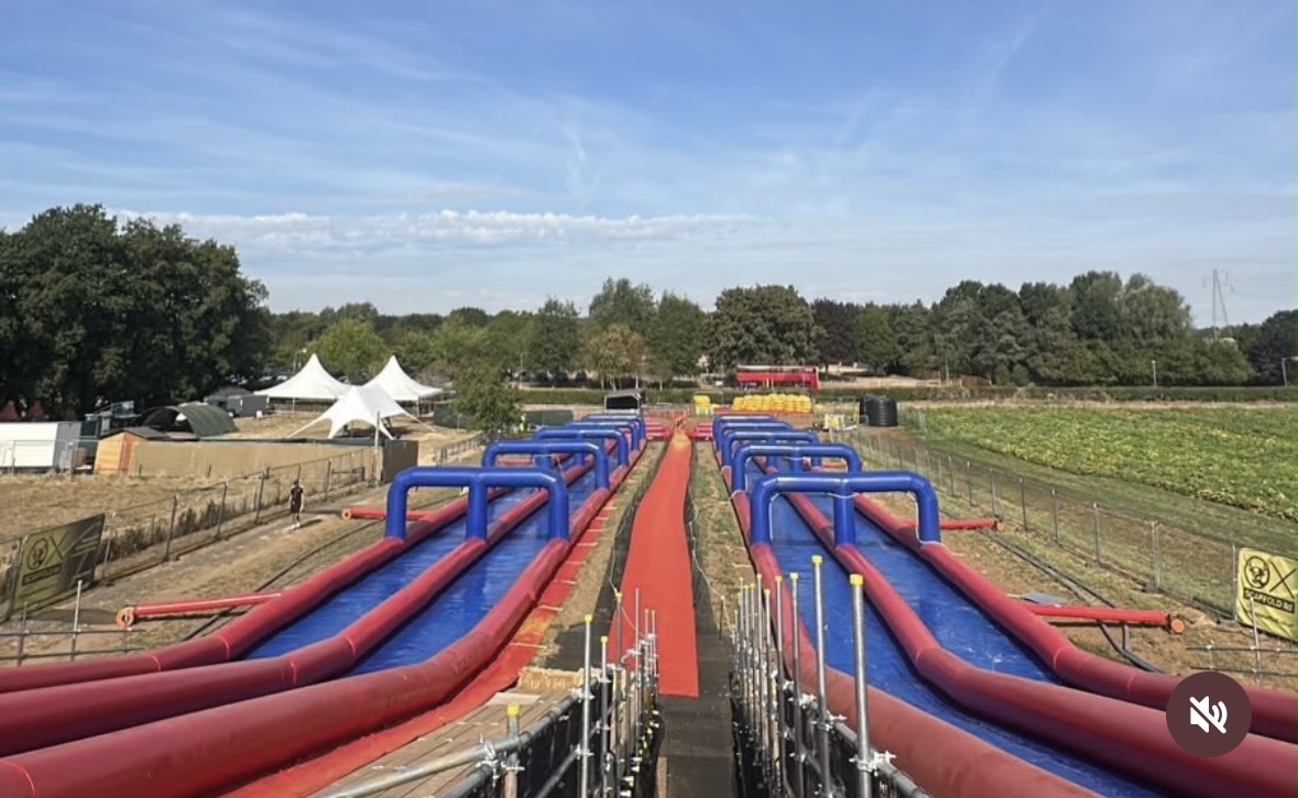 View down the 100-metre slide lanes from the top platform at Millets Farm